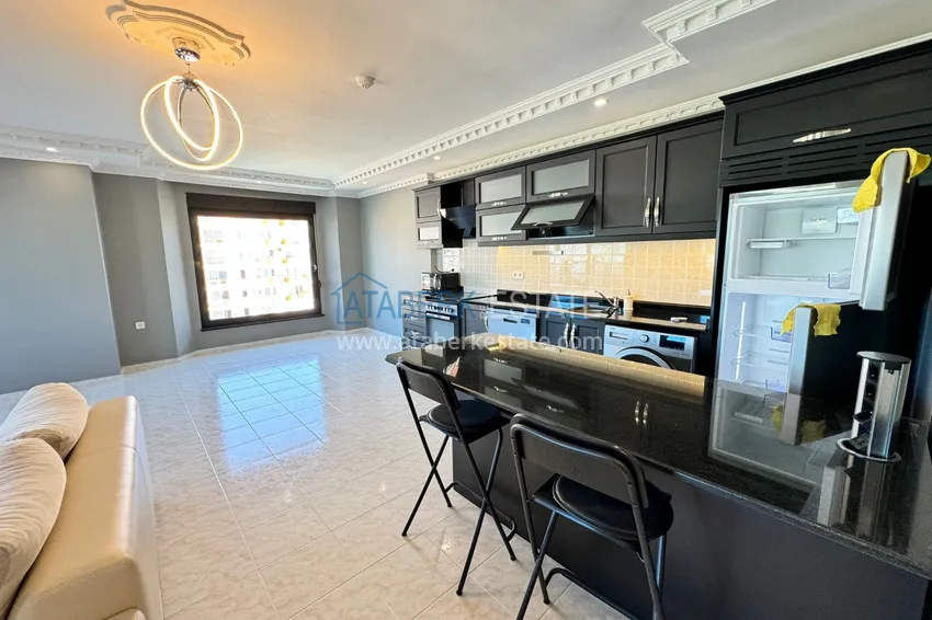 Приобрести Квартира в Махмутларе частично меблированная с застекленным балконом и видом на море 4 