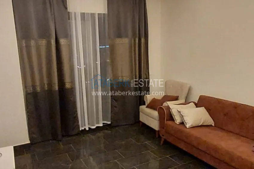 Приобрести Квартира 1+1 с мебелью и видом на море в новом комплексе - район Махмутлар, Алания 3