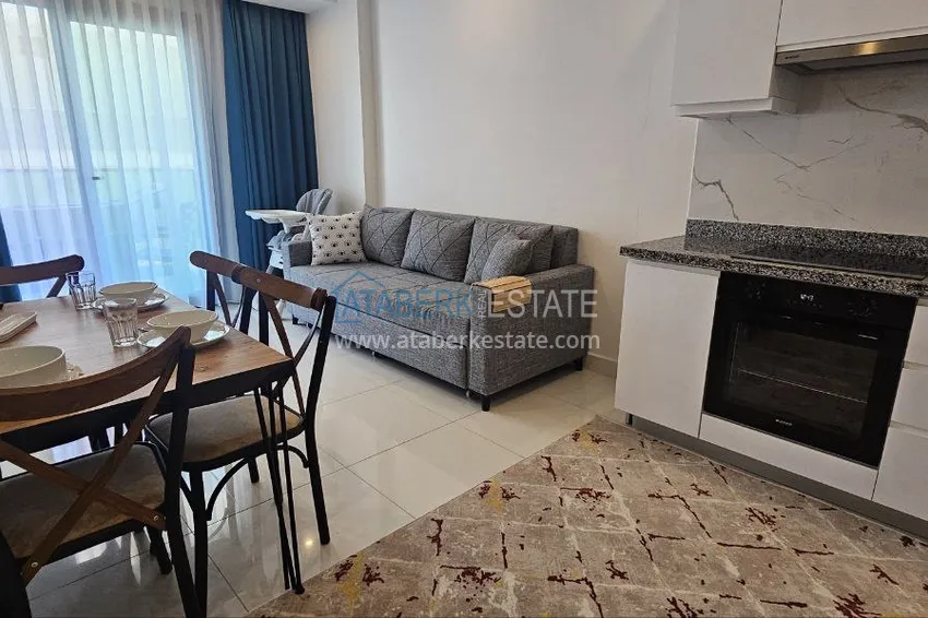 Приобрести Квартира 1+1 с мебелью в 300 метрах от моря, район Махмутлар – Алания 4 