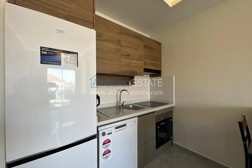 Приобрести Квартира 1+1 с мебелью и видом на море, район Махмутлар – Алания 5 