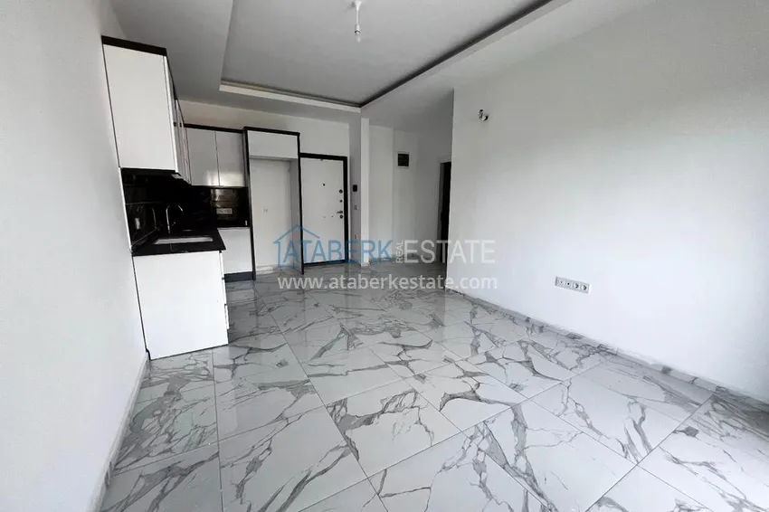 Приобрести Двухкомнатная квартира в новом комплексе комфорт-класса в районе Демирташ, Алания 6