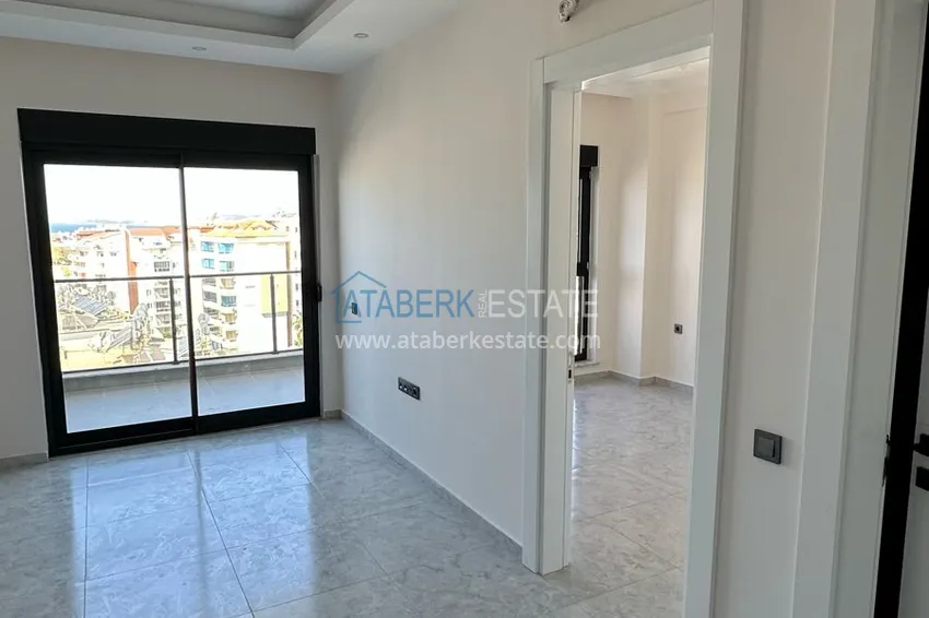 Приобрести Двухкомнатная квартира с видом на море в новом комплексе – Алания, район Авсаллар 4 