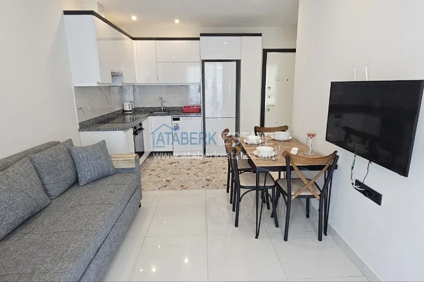 Приобрести Квартира 1+1 с мебелью в 300 метрах от моря, район Махмутлар – Алания 6 