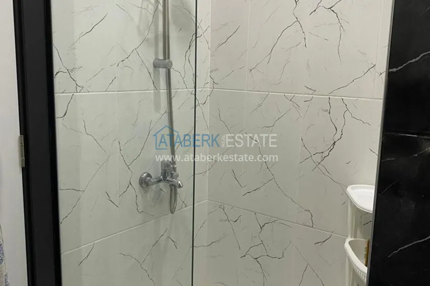 Приобрести Двухкомнатная квартира с мебелью в современном комплексе, район Авсаллар 6 