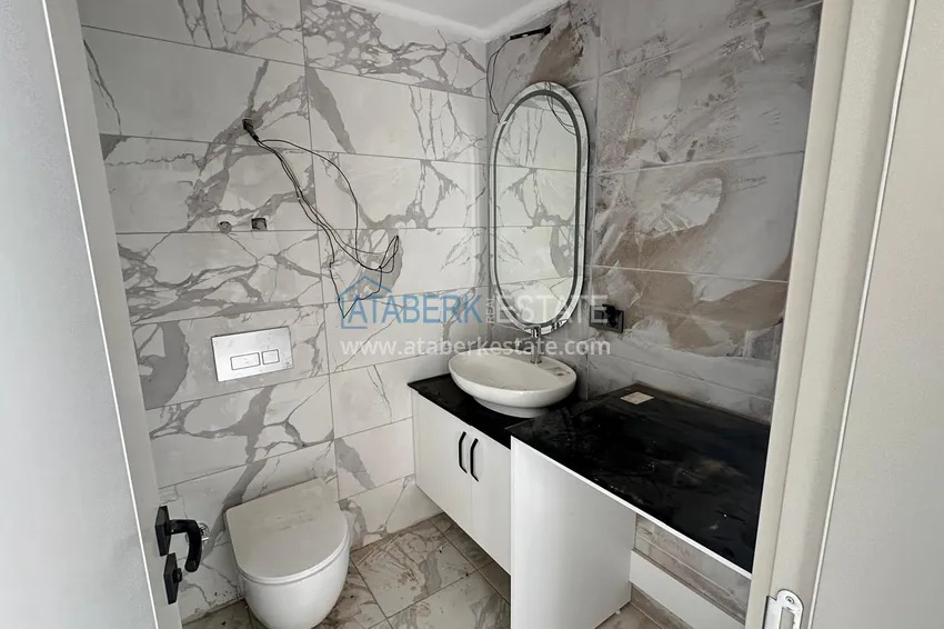 Приобрести Квартира 1+1 с чистовой отделкой в новом жилом комплексе, район Авсаллар – Алания 6 