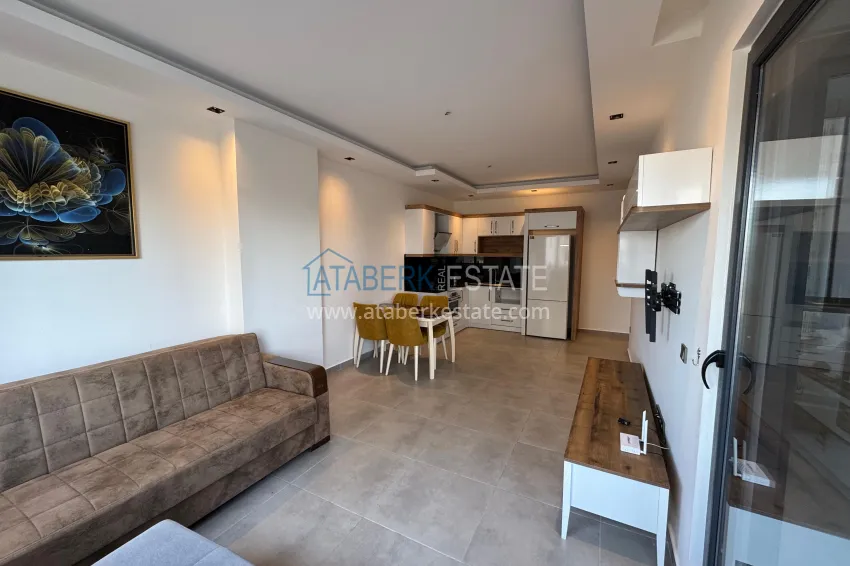 Приобрести Двухкомнатная квартира с мебелью и застекленным балконом в районе Махмутлар, Алания 6