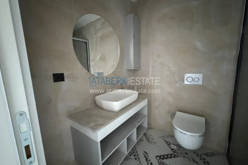 Приобрести Двухкомнатная квартира с чистовой отделкой в Мерсине, район Эрдемли – Арпачбахшиш 6 