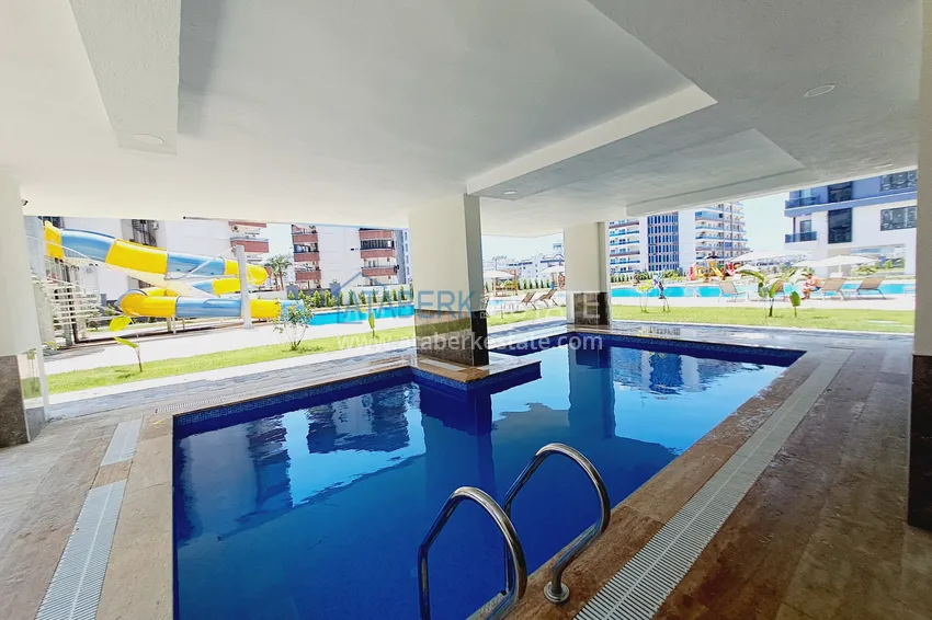 Квартира 1+1 с новой мебелью и видом на горы в современном комплексе - район Махмутлар, Алания 7 