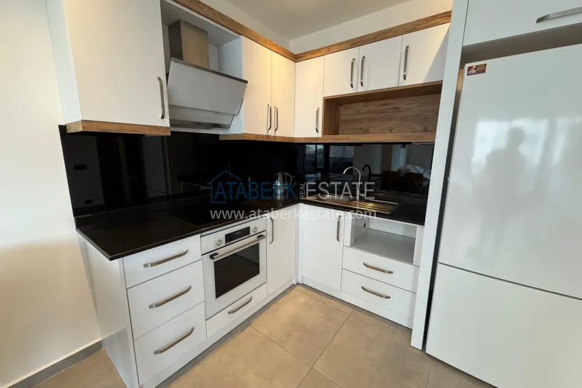 Приобрести Двухкомнатная квартира с мебелью и застекленным балконом в районе Махмутлар, Алания 7