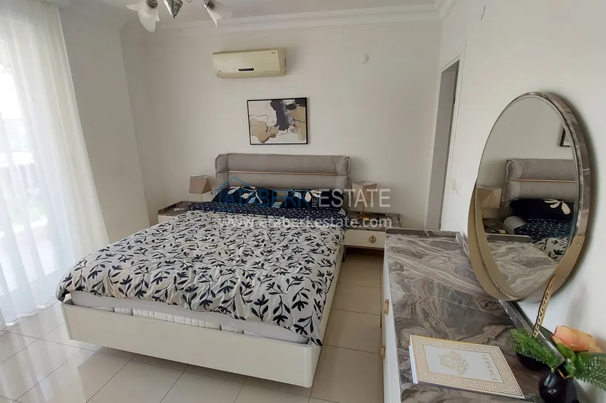 Приобрести Трехкомнатная меблированная квартира у моря, в районе Кестель - Алания 8 