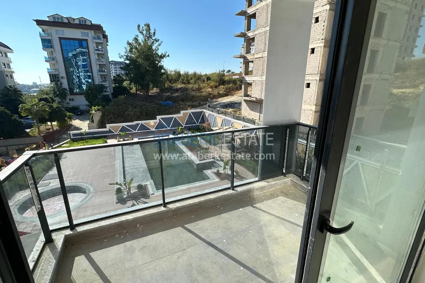 Приобрести Квартира 1+1 с чистовой отделкой в новом жилом комплексе, район Авсаллар – Алания 8 