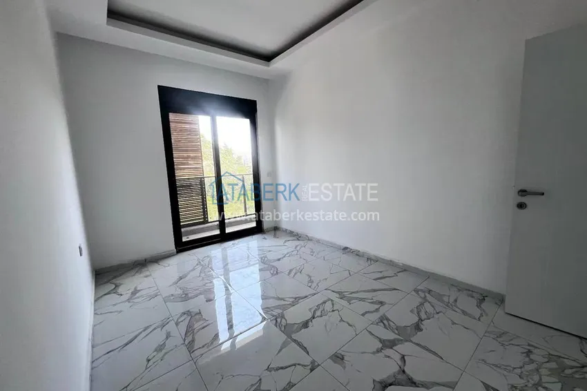 Приобрести Двухкомнатная квартира в новом комплексе комфорт-класса в районе Демирташ, Алания 9