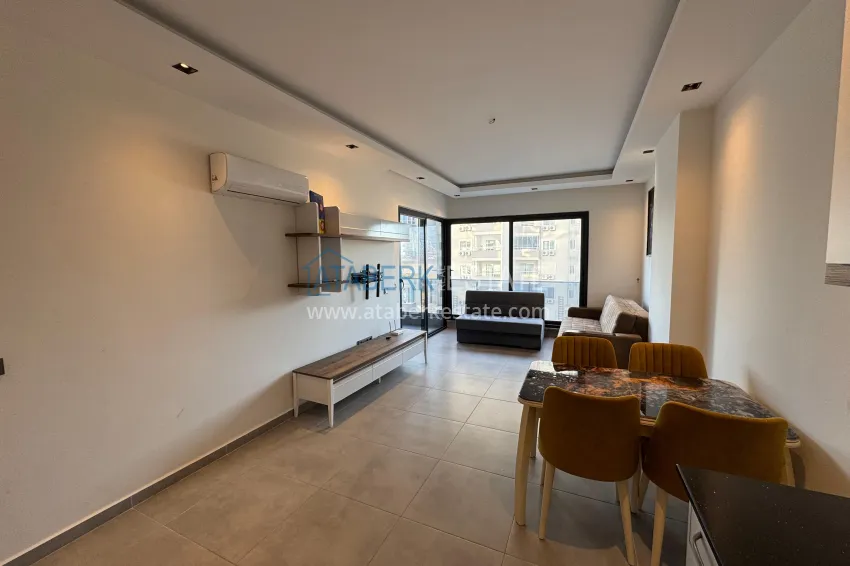 Приобрести Двухкомнатная квартира с мебелью и застекленным балконом в районе Махмутлар, Алания 8