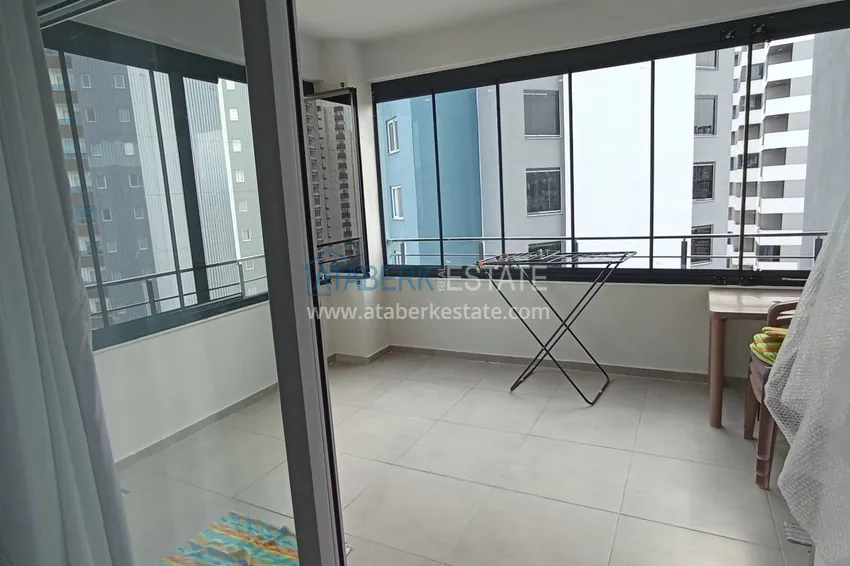 Приобрести Просторная квартира 1+1 с видом на море и 2 застекленными балконами в Мерсине, Арпачбахшиш 9 