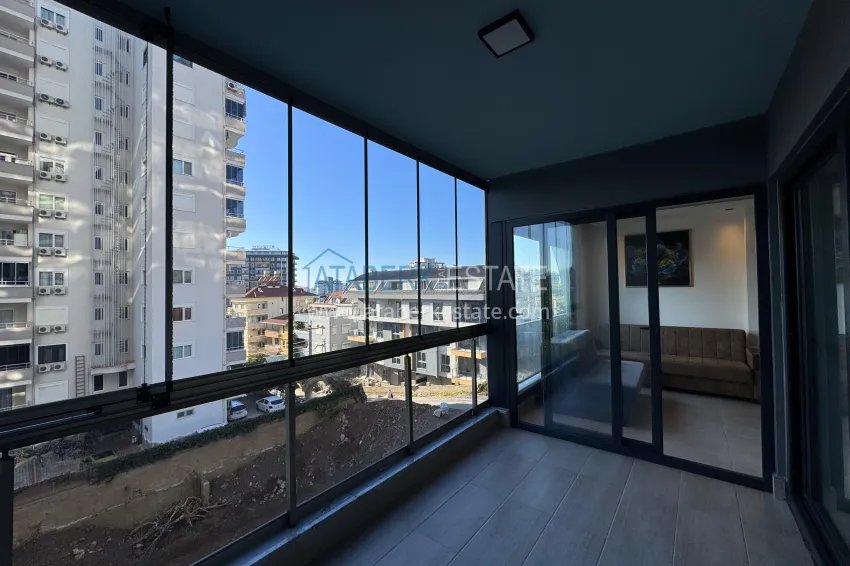 Приобрести Двухкомнатная квартира с мебелью и застекленным балконом в районе Махмутлар, Алания 10