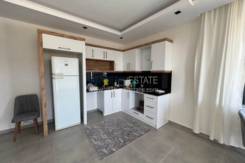 Приобрести Двухкомнатная квартира с видом на море и горы, район Махмутлар – Алания 9 