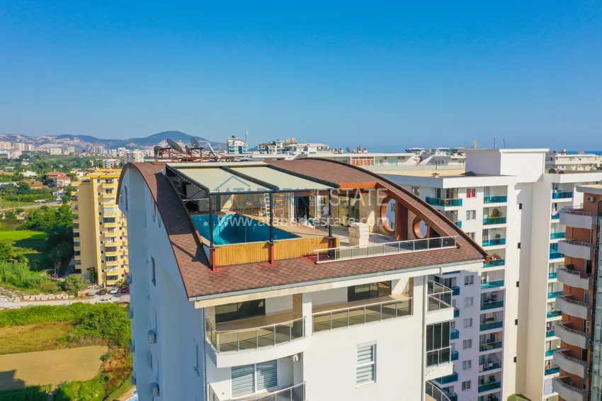 Трехкомнатная квартира с мебелью и отдельной кухней в районе Махмутлар 11 