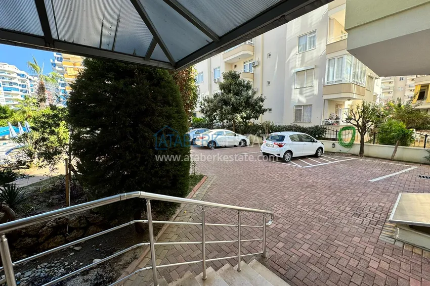 Квартира в Махмутларе частично меблированная с застекленным балконом и видом на море 10 