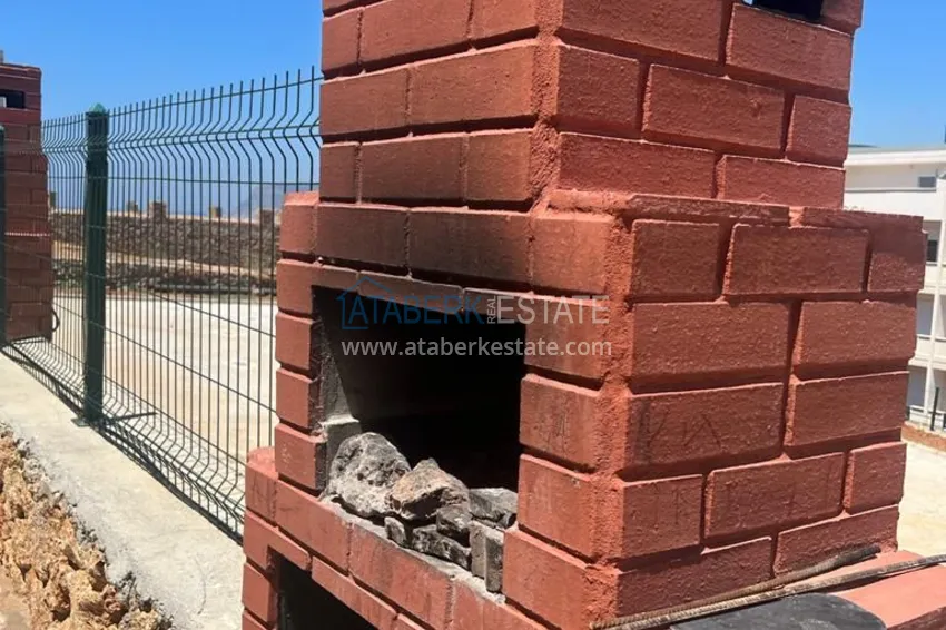 Квартира в районе Оба с качественной чистовой отделкой и открытым видом на горы 9