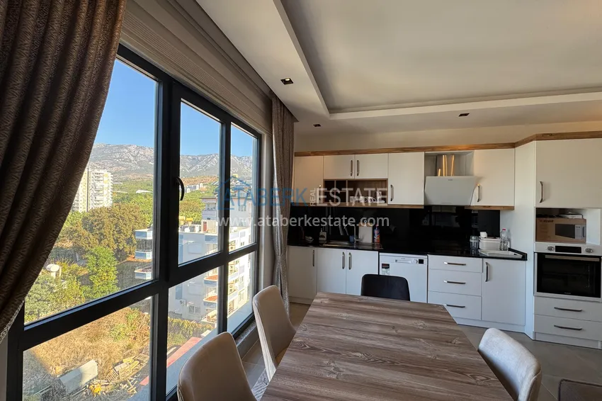 Приобрести Трёхкомнатная квартира с мебелью и видом на горы, район Махмутлар – Алания 9