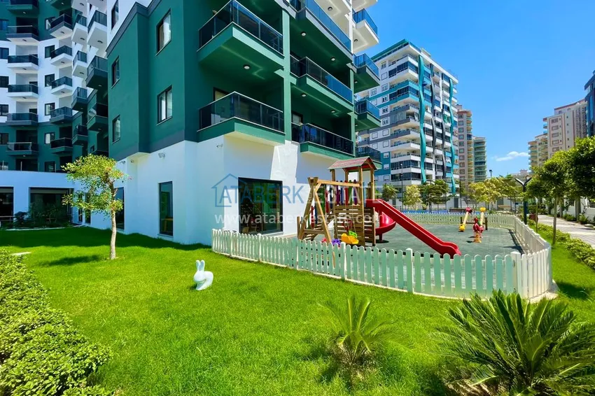 Меблированная двухкомнатная квартира в комплексе с отельной инфраструктурой, район Махмутлар – Алания 12 