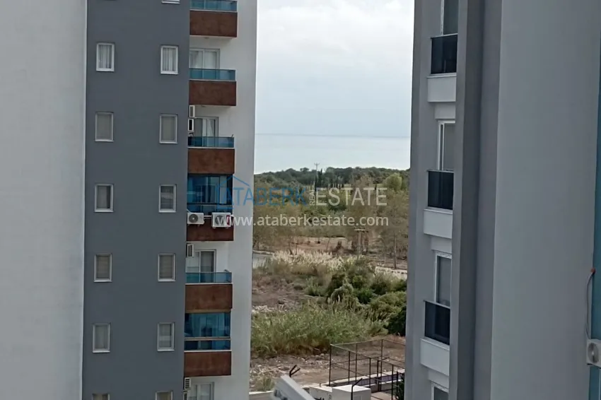Приобрести Просторная квартира 1+1 с видом на море и 2 застекленными балконами в Мерсине, Арпачбахшиш 10 