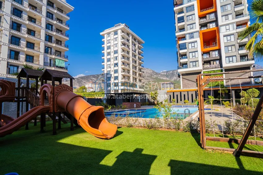 Двухкомнатная квартира с новой мебелью в центр Махмутлара, район субботнего рынка 11 