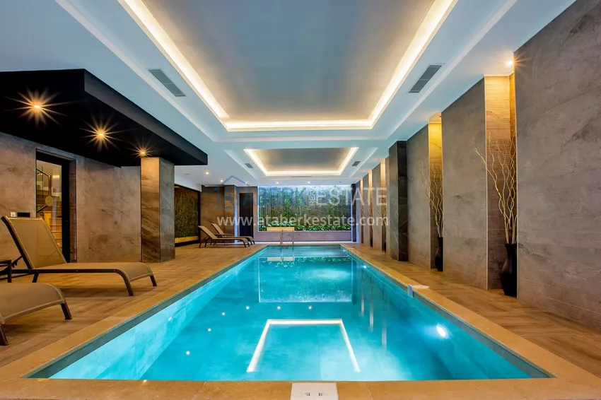 Квартира 1+1 меблированная в комплексе класса люкс – центр Алании 12