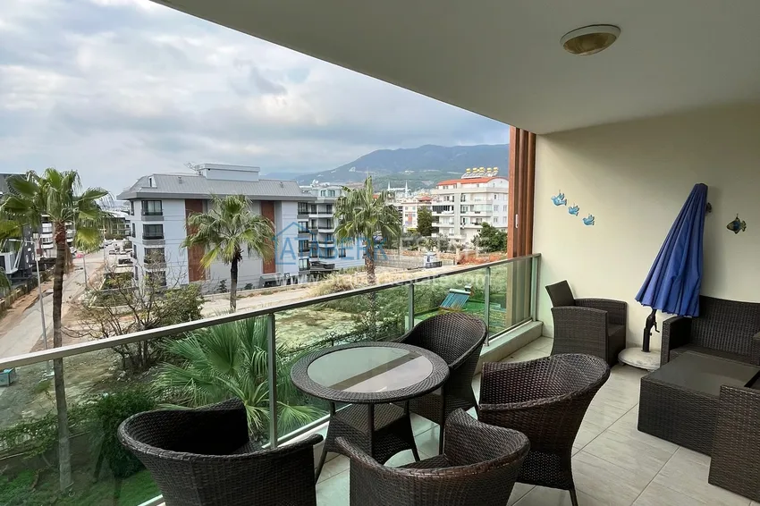 Приобрести Трехкомнатная квартира с мебелью в районе Оба в комфортабельном семейном комплексе 12