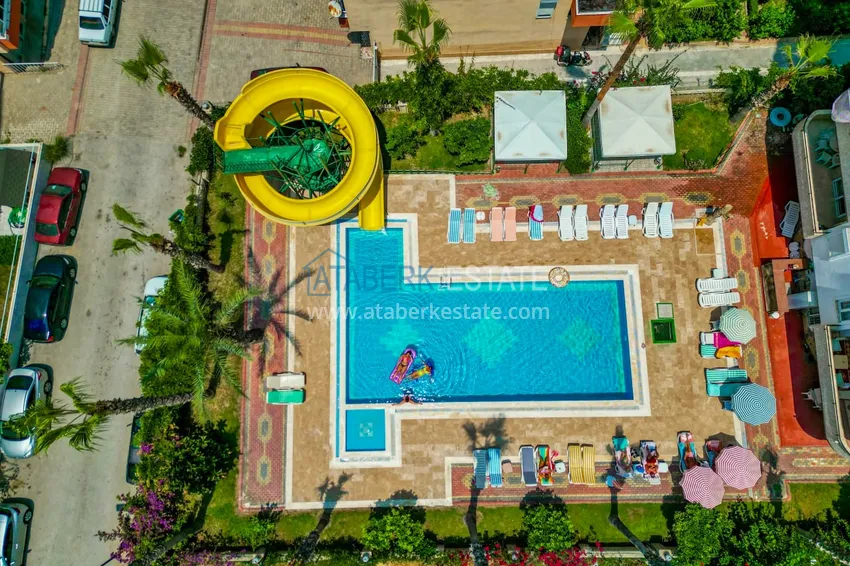 Приобрести Линейная четырехкомнатная квартира с мебелью и видом на море - Махмутлар 13 