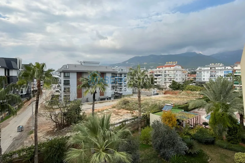 Приобрести Трехкомнатная квартира с мебелью в районе Оба в комфортабельном семейном комплексе 13