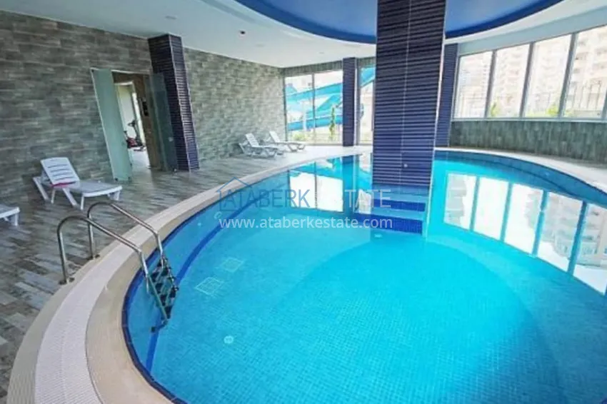 Огромная квартира 1+1 площадью 110 м2 в центре района Махмутлар 19 