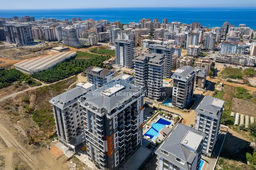 Двухкомнатная квартира с новой мебелью в центр Махмутлара, район субботнего рынка 2 