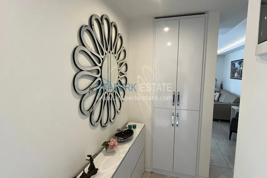 Приобрести Трехкомнатная квартира с мебелью в районе Оба в комфортабельном семейном комплексе 2