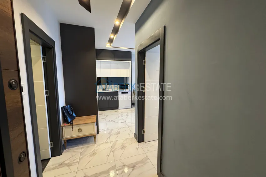 Приобрести Двухкомнатная квартира в центре Махмутлара – полностью готова к проживанию 2 