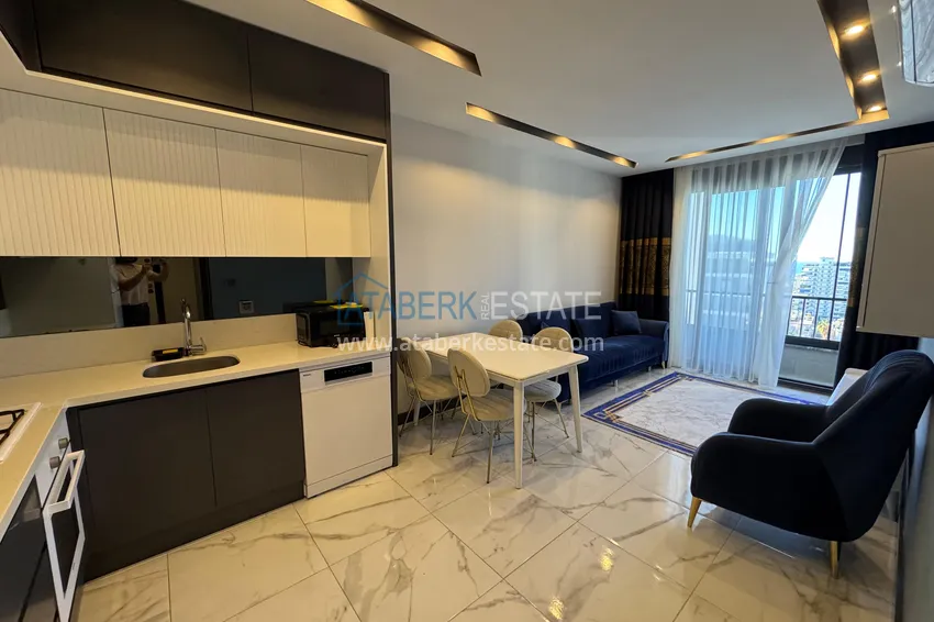 Приобрести Двухкомнатная квартира в центре Махмутлара – полностью готова к проживанию 3 