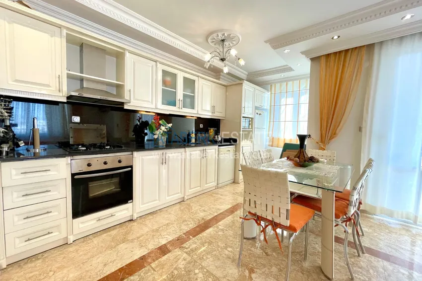 Приобрести Линейная четырехкомнатная квартира с мебелью и видом на море - Махмутлар 4 