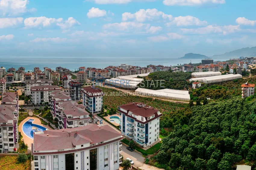 Двухкомнатная квартира под ключ с видом на горы в Алании, район Кестель 4