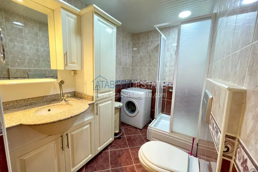 Приобрести Линейная четырехкомнатная квартира с мебелью и видом на море - Махмутлар 8 