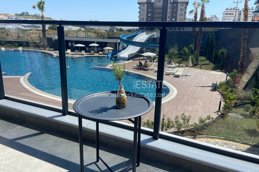 Приобрести Квартира 2+1 с мебелью в комфортабельном комплексе – Алания, район Авсаллар 11 