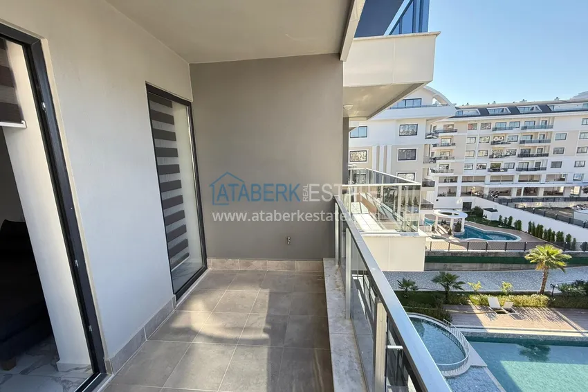 Приобрести Двухкомнатная квартира под ключ в комплексе комфорт-класса – вторая береговая линия, район Каргыджак, Алания 15