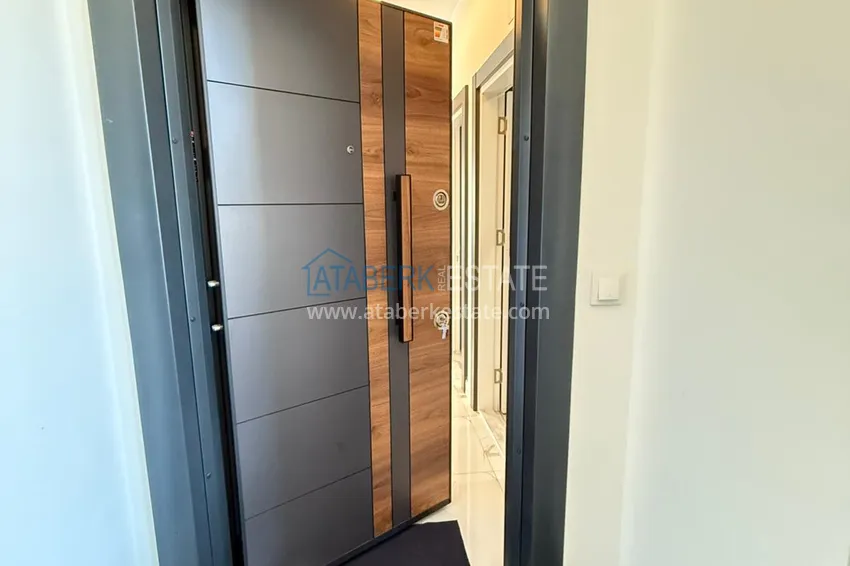 Приобрести Двухкомнатная квартира под ключ в комплексе комфорт-класса – вторая береговая линия, район Каргыджак, Алания 1