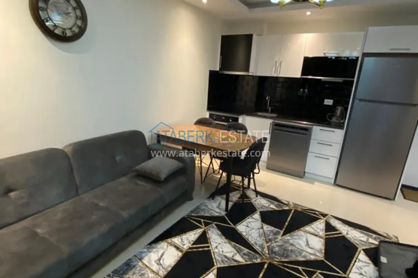 Приобрести Двухкомнатная квартира с мебелью в резиденции с отельной инфраструктурой – Алания, район Авсаллар 2 