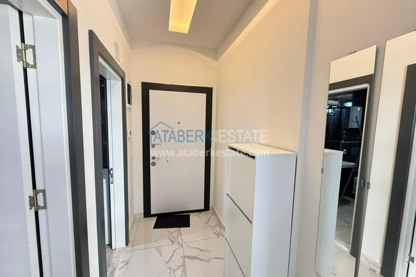 Приобрести Двухкомнатная квартира под ключ в комплексе комфорт-класса – вторая береговая линия, район Каргыджак, Алания 3