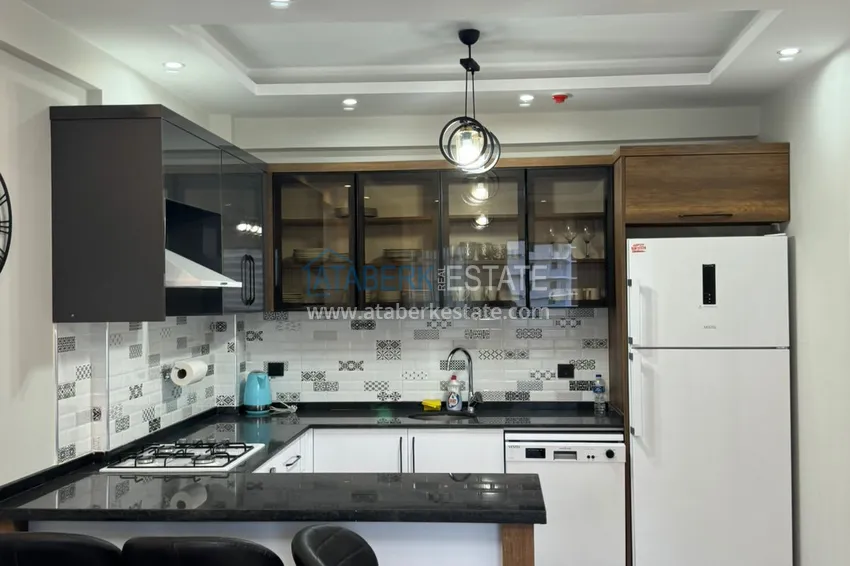 Приобрести Двухкомнатная квартира с мебелью в благоустроенном комплексе – Мерсин, район Томюк 4