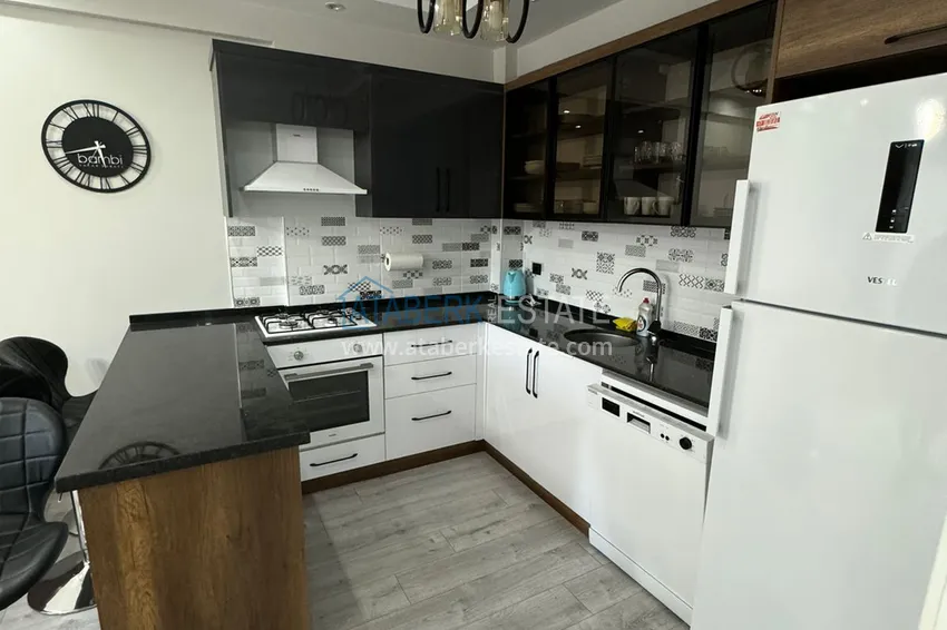 Приобрести Двухкомнатная квартира с мебелью в благоустроенном комплексе – Мерсин, район Томюк 5