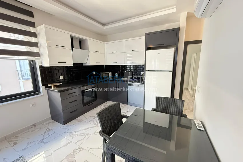 Приобрести Двухкомнатная квартира под ключ в комплексе комфорт-класса – вторая береговая линия, район Каргыджак, Алания 5