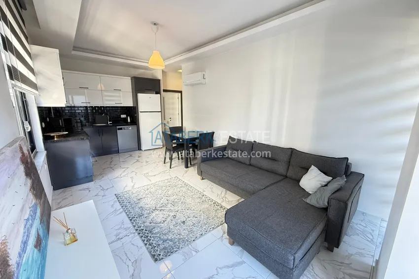 Приобрести Двухкомнатная квартира под ключ в комплексе комфорт-класса – вторая береговая линия, район Каргыджак, Алания 7