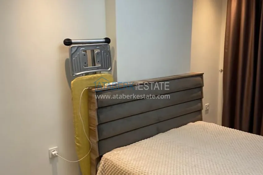 Приобрести Двухкомнатная квартира с мебелью в резиденции с отельной инфраструктурой – Алания, район Авсаллар 8 