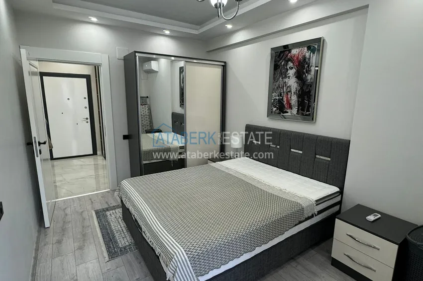 Приобрести Двухкомнатная квартира с мебелью в благоустроенном комплексе – Мерсин, район Томюк 8